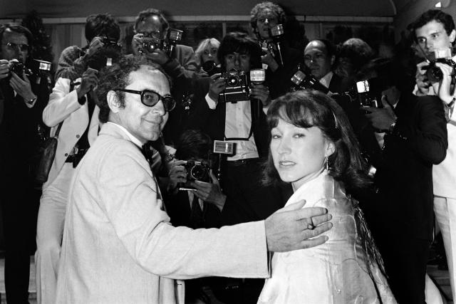 (FILES) Swiss film director Jean-Luc Godard accompanied by French actress Nathalie Baye pose for the presentation of his film "Sauve qui peut (la vie)", on May 22, 1980 during the 33th Cannes International Film Festival. Nathalie Baye, 77, passed away on April 17, 2026, announced her family to Agence France-Presse on April 18, 2026. (Photo by Raph GATTI / AFP)