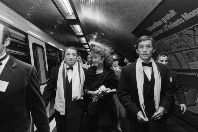 (FILES) French Actors Claude Brasseur (L), Nathalie Baye (C) and Belgian former racing driver Jacky Ickx (R) get out the subway to attend the 8th César Awards in Paris on February 26 février 1983. Nathalie Baye, 77, passed away on April 17, 2026, announced her family to Agence France-Presse on April 18, 2026. (Photo by Joel ROBINE / AFP)
