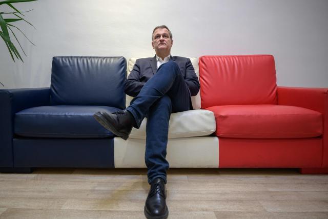 (FILES) Mayor of Perpignan and Vice President of the far-right party Rassemblement National (RN) Louis Aliot poses for a photo at his office in Perpinan on February 6, 2026. Far-right party Rassemblement National (RN) Louis Aliot was elected president of the urban community on April 18, 2026, making it the largest now led by the far-right party. (Photo by Ed JONES / AFP)