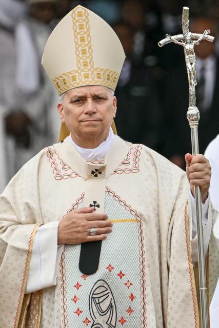 Pope Leo XIV arrives to lead a Holy Mass at the Yaounde Ville Airport in Yaounde on the sixth day of an 11-day apostolic journey to Africa, on April 18, 2026. (Photo by Alberto PIZZOLI / AFP)