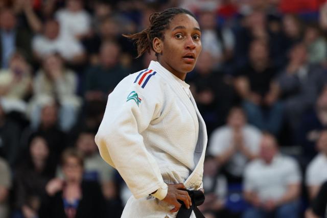 France's Melkia Auchecorne (white) reacts after losing to Hungary's Szofi Ozbas in the women's under 70 kg category gold medal bout at the Judo European Senior Championships 2026 in Tbilisi on April 18, 2026. (Photo by Giorgi ARJEVANIDZE / AFP)