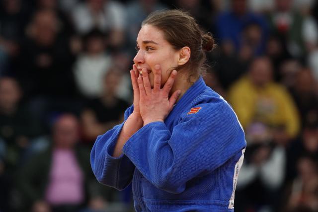Hungary's Szofi Ozbas wins against France's Melkia Auchecorne in the women's under 70 kg category gold medal bout at the Judo European Senior Championships 2026 in Tbilisi on April 18, 2026. (Photo by Giorgi ARJEVANIDZE / AFP)