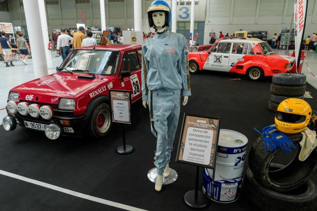 Visitors look at a Renault car display at the Retro Auto Moto Valladolid Show during the celebration of Renault FASA's 75th anniversary in Valladolid, Spain on April 18, 2026. (Photo by CESAR MANSO / AFP)
