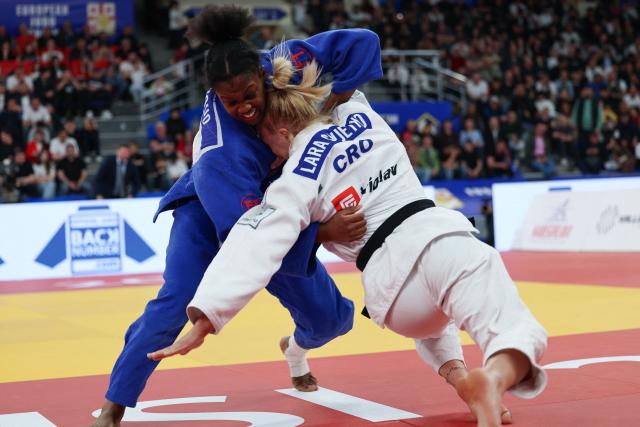 Croatia's Lara Cvjetko (white) and Switzerland's April Lynn Fohouo compete in the women's under 70 kg category bronze medal bout at the Judo European Senior Championships 2026 in Tbilisi on April 18, 2026. (Photo by Giorgi ARJEVANIDZE / AFP)