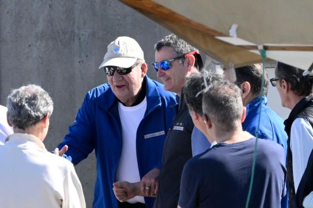 Spain's former King Juan Carlos I (L) arrives at the Royal Yacht Club of Sanxenxo, northern Spain on April 18, 2026. The former head of state, who served as monarch between 1975 and 2014 arrived to attend a regatta. (Photo by Miguel RIOPA / AFP)