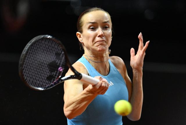 Ukraine’s Elina Svitolina returns the ball to Czech Republic’s Karolina Muchova (not in picture) during their semifinal match at the Women's Tennis Grand Prix WTA tournament in Stuttgart, southwestern Germany, on April 18, 2026. (Photo by THOMAS KIENZLE / AFP)