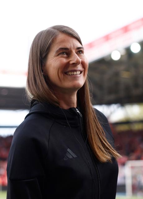 Union Berlin's German head coach Marie-Louise Eta is pictured prior to the German first division Bundesliga football match between Union Berlin and VfL Wolfsburg in Berlin, Germany, on April 18, 2026. (Photo by Odd ANDERSEN / AFP) / DFL REGULATIONS PROHIBIT ANY USE OF PHOTOGRAPHS AS IMAGE SEQUENCES AND/OR QUASI-VIDEO