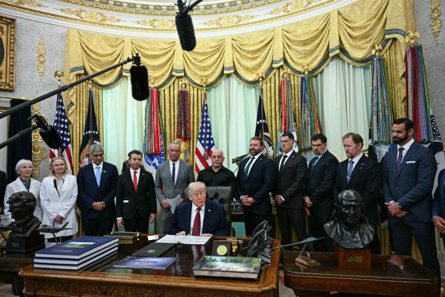 US President Donald Trump speaks before signing an executive order in the Oval Office of the White House in Washington, DC on April 18, 2026. The executive order aims to further US federal medical research and clinical trials for certain psychedelic drugs. (Photo by Jim WATSON / AFP)