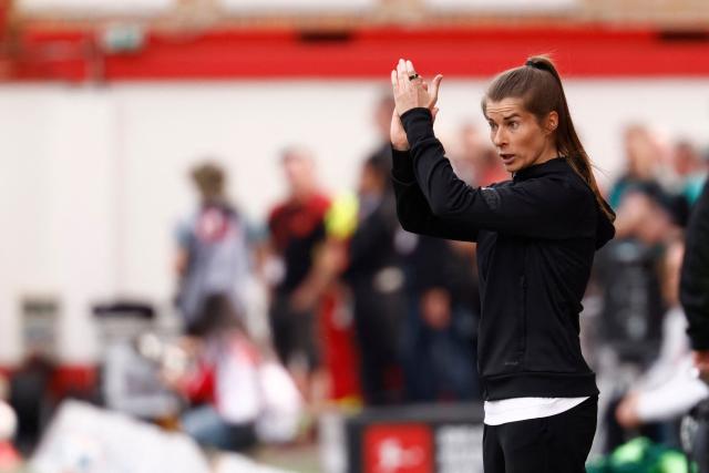 Union Berlin's German head coach Marie-Louise Eta gestures from the sidelines during the German first division Bundesliga football match between Union Berlin and VfL Wolfsburg in Berlin, Germany, on April 18, 2026. (Photo by Odd ANDERSEN / AFP) / DFL REGULATIONS PROHIBIT ANY USE OF PHOTOGRAPHS AS IMAGE SEQUENCES AND/OR QUASI-VIDEO