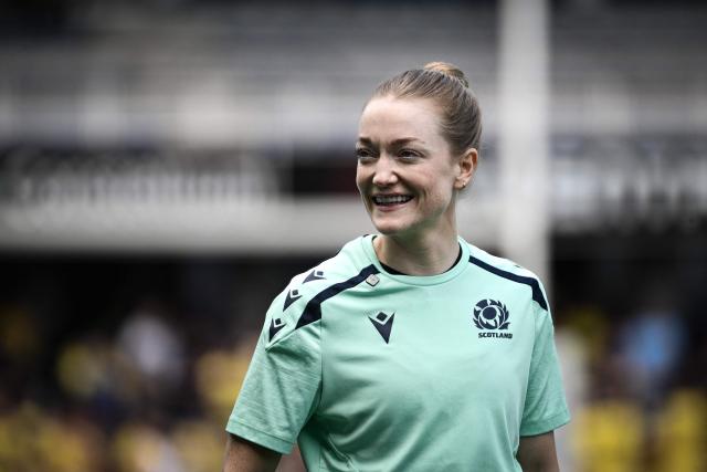 Scottish referee Hollie Davidson looks on ahead of the French Top14 rugby union match between ASM Clermont Auvergne and Lyon Olympique Universitaire Rugby at the Marcel-Michelin Stadium in Clermont-Ferrand, central France on April 18, 2026. Hollie Davidson is the first woman to referee a match in France’s Top 14 rugby union championship. (Photo by ARNAUD FINISTRE / AFP)