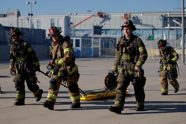 Firefighters take part in emergency response drills at the rail station near MetLife Stadium ahead of the 2026 FIFA World Cup in East Rutherford, New Jersey, on April 18, 2026. (Photo by Leonardo MUNOZ / AFP)