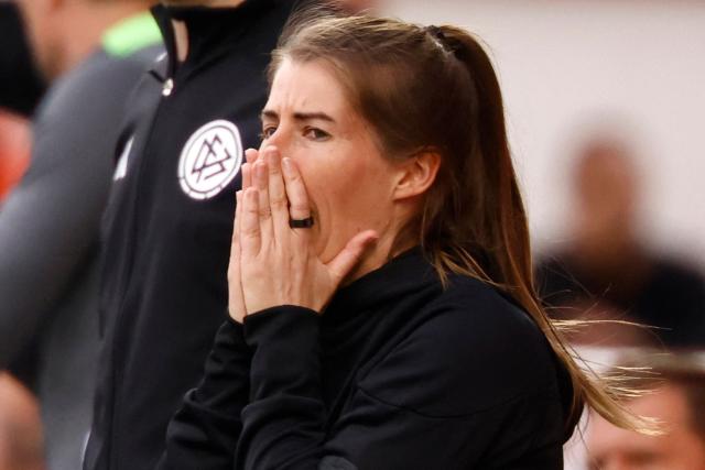 Union Berlin's German head coach Marie-Louise Eta reacts from the sidelines during the German first division Bundesliga football match between Union Berlin and VfL Wolfsburg in Berlin, Germany, on April 18, 2026. (Photo by Odd ANDERSEN / AFP) / DFL REGULATIONS PROHIBIT ANY USE OF PHOTOGRAPHS AS IMAGE SEQUENCES AND/OR QUASI-VIDEO