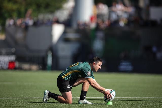 Montauban's French fly-half Thomas Fortunel a player adjusts the ball on a tee before a try conversion during the French Top 14 rugby union match between US Montauban and Rugby Club Toulonnais (RCT) at Stade Sapiac in Montauban, south-western France, on April 18, 2026. (Photo by Valentine CHAPUIS / AFP)