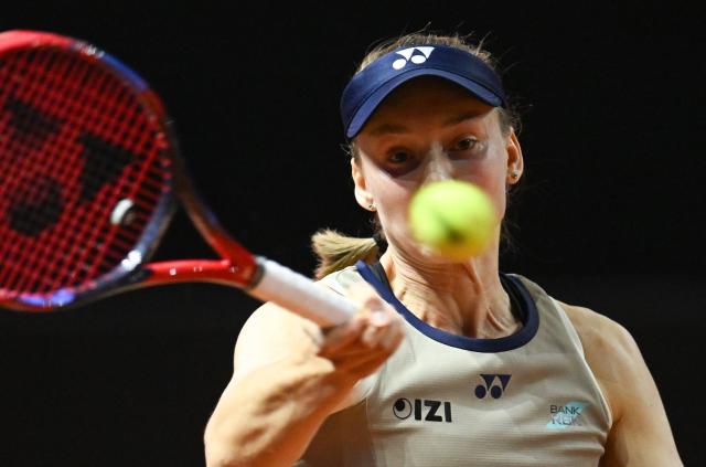 Kazakhstan’s Elena Rybakina returns the ball to Russia’s Mirra Andreeva (not in picture) during their semifinal match at the Women's Tennis Grand Prix WTA tournament in Stuttgart, southwestern Germany, on April 18, 2026. (Photo by THOMAS KIENZLE / AFP)