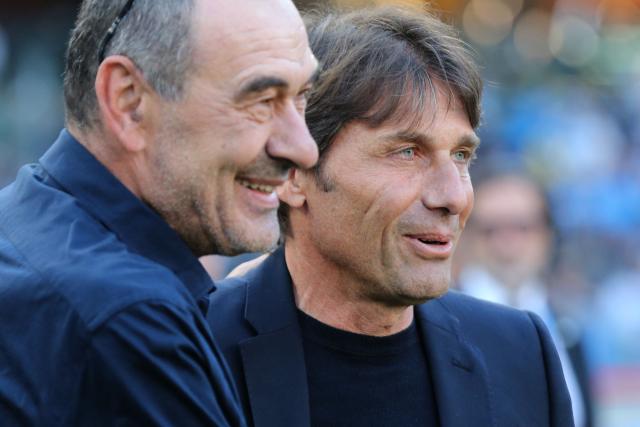Lazio's Italian coach Maurizio Sarri greets Napoli's Italian coach Antonio Conte before the Italian Serie A football match between Napoli and Lazio at the Diego Armando Maradona stadium in Naples on April 18, 2026. (Photo by Carlo Hermann / AFP)