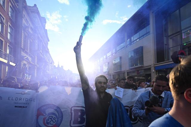 Chelsea fans joined by the fans of French club Strasbourg hold a protest against BlueCo group, led by American businessman Todd Boehly outside the ground before the English Premier League football match between Chelsea and Manchester United at Stamford Bridge in London on April 18, 2026. (Photo by Glyn KIRK / AFP)
