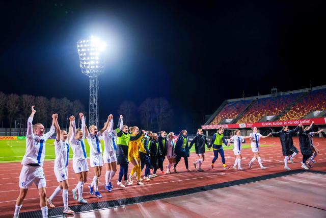Finland's players celebrate after the Women's FIFA world cup league B, group B3, qualifier football match between Latvia and Finland at Daugava in Riga, Latvia, on April 18, 2026. (Photo by Gints Ivuskans / AFP)