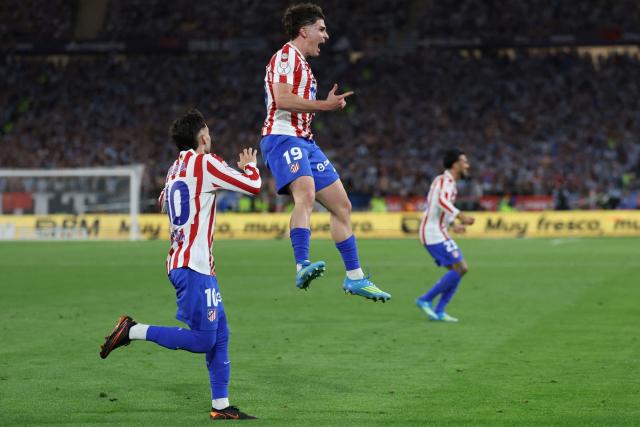 Atletico Madrid's Argentine forward #19 Julian Alvarez celebrates scoring his team's second goal during the Copa del Rey (King's Cup) final football match between Club Atletico de Madrid and Real Sociedad at La Cartuja stadium in Seville on April 18, 2026. (Photo by Thomas COEX / AFP)