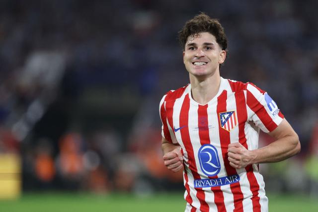 TOPSHOT - Atletico Madrid's Argentine forward #19 Julian Alvarez celebrates scoring his team's second goal during the Copa del Rey (King's Cup) final football match between Club Atletico de Madrid and Real Sociedad at La Cartuja stadium in Seville on April 18, 2026. (Photo by Thomas COEX / AFP)