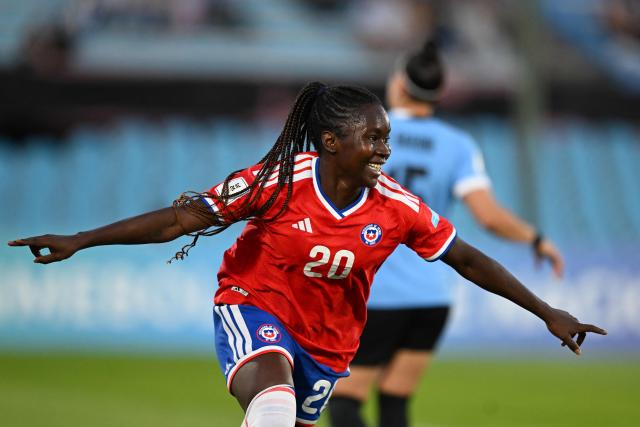 Chile's midfielder #20 Mary Valencia celebrates scoring her team's first goal during the CONMEBOL Nations League Women football match between Uruguay and Chile at the Centenario stadium in Montevideo, on April 18, 2026. (Photo by Eitan ABRAMOVICH / AFP)