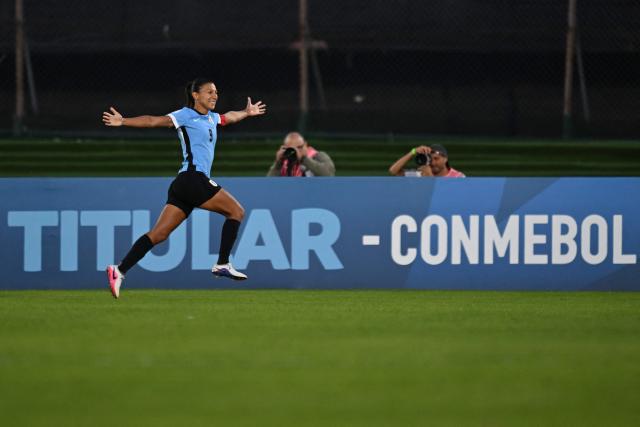 Uruguay's midfielder #09 Pamela Gonzalez celebrates scoring her team's first goal during the CONMEBOL Nations League Women football match between Uruguay and Chile at the Centenario stadium in Montevideo, on April 18, 2026. (Photo by Eitan ABRAMOVICH / AFP)