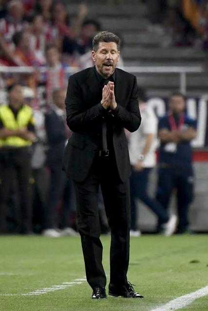 Atletico Madrid's Argentine coach Diego Simeone gestures on the touchline during the Copa del Rey (King's Cup) final football match between Club Atletico de Madrid and Real Sociedad at La Cartuja stadium in Seville on April 18, 2026. (Photo by CRISTINA QUICLER / AFP)