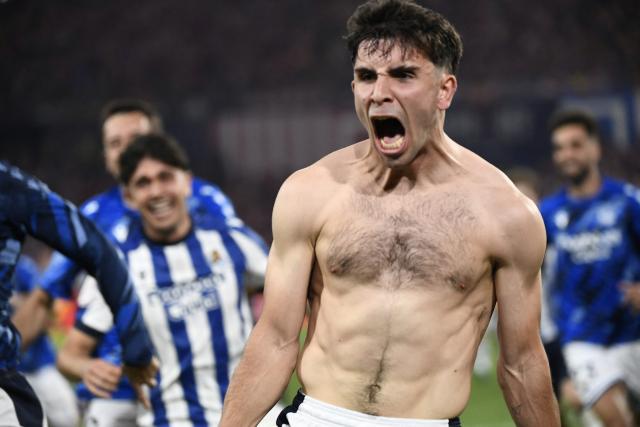 Real Sociedad's Spanish midfielder #15 Pablo Marin celebrates scoring the victory goal during the penalty shoot-out during the Copa del Rey (King's Cup) final football match between Club Atletico de Madrid and Real Sociedad at La Cartuja stadium in Seville on April 18, 2026. (Photo by CRISTINA QUICLER / AFP)