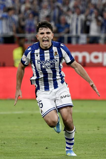 Real Sociedad's Spanish midfielder #15 Pablo Marin celebrates scoring the victory goal during the penalty shoot-out during the Copa del Rey (King's Cup) final football match between Club Atletico de Madrid and Real Sociedad at La Cartuja stadium in Seville on April 18, 2026. (Photo by CRISTINA QUICLER / AFP)