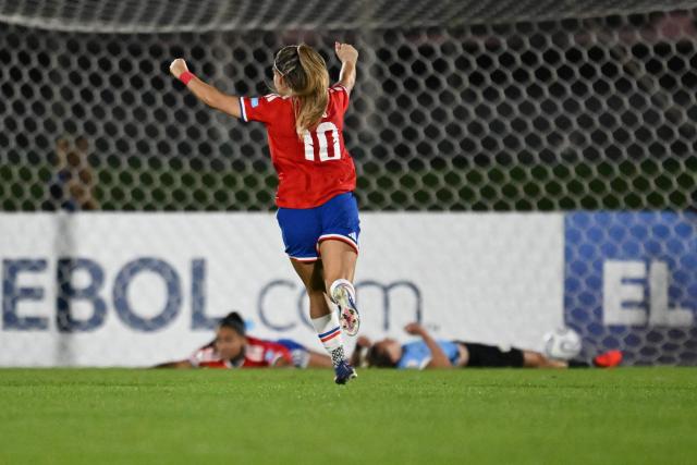 Chile's midfielder #10 Yanara Aedo celebrates her team's third goal scored by forward #07 Vaitiare Pardo (unseen) during the CONMEBOL Nations League Women football match between Uruguay and Chile at the Centenario stadium in Montevideo, on April 18, 2026. (Photo by Eitan ABRAMOVICH / AFP)