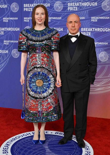 Creators of the Breakthrough Prize, Russian photographer Julia Milner and her husband Russian-Israeli entrepreneur Yuri Milner attend the 12th Breakthrough Prize Ceremony at Barker Hangar in Santa Monica, California on April 18, 2026. (Photo by Lisa O'CONNOR / AFP)