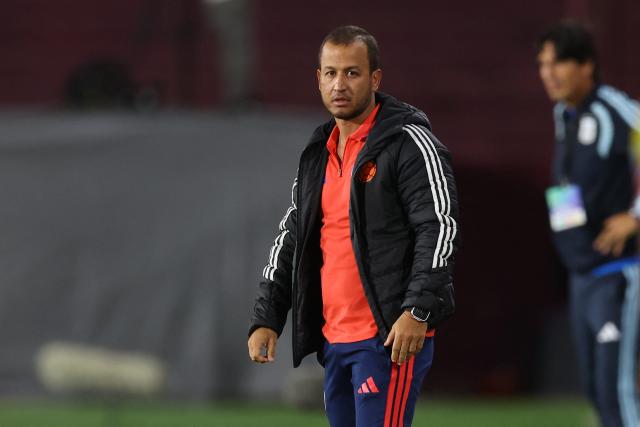 Colombia's head coach Angelo Marsiglia gestures during the CONMEBOL Nations League Women football match between Argentina and Colombia, at the Ciudad de Lanus stadium in Lanus, Buenos Aires province, Argentina, on April 18, 2026. (Photo by Alejandro PAGNI / AFP)