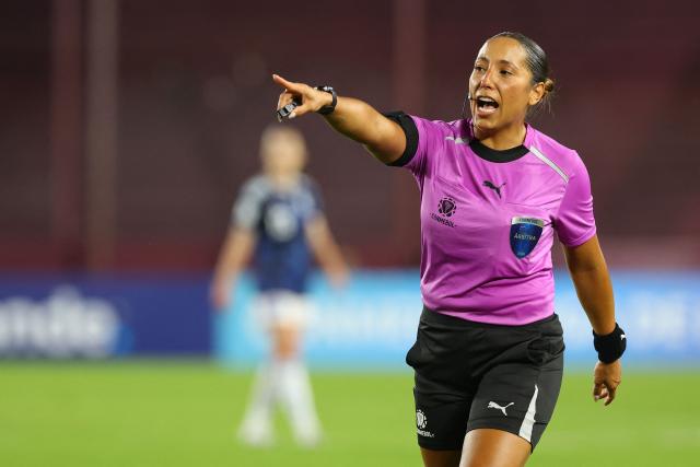 Venezuelan referee Emikar Calderas gestures during the CONMEBOL Nations League Women football match between Argentina and Colombia, at the Ciudad de Lanus stadium in Lanus, Buenos Aires province, Argentina, on April 18, 2026. (Photo by Alejandro PAGNI / AFP)