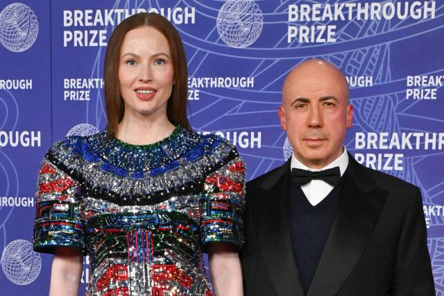 Creators of the Breakthrough Prize, Russian photographer Julia Milner and her husband Russian-Israeli entrepreneur Yuri Milner attend the 12th Breakthrough Prize Ceremony at Barker Hangar in Santa Monica, California on April 18, 2026. (Photo by Lisa O'CONNOR / AFP) / ALTERNATE CROP