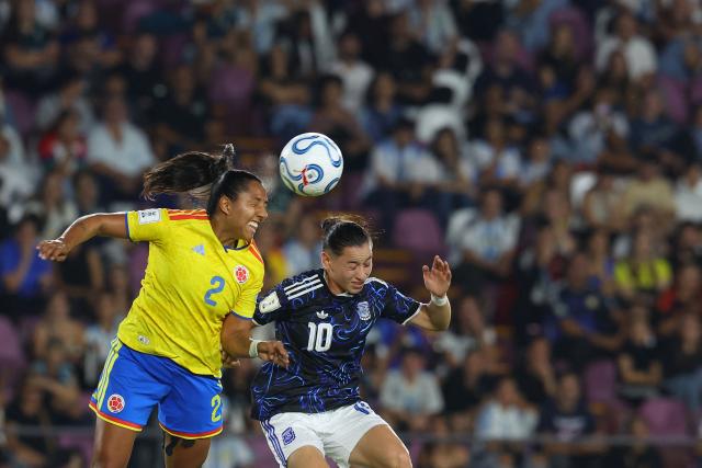 Colombia's defender #02 Manuela Vanegas heads the ball past Argentina's midfielder #10 Maricel Pereyra during the CONMEBOL Nations League Women football match between Argentina and Colombia, at the Ciudad de Lanus stadium in Lanus, Buenos Aires province, Argentina, on April 18, 2026. (Photo by Alejandro PAGNI / AFP)