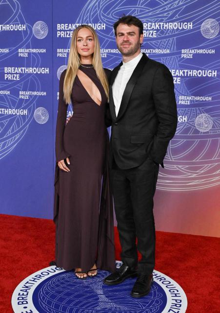 US DJ Alex Pall from The Chainsmokers and guest attend the 12th Breakthrough Prize Ceremony at Barker Hangar in Santa Monica, California on April 18, 2026. (Photo by Lisa O'CONNOR / AFP)