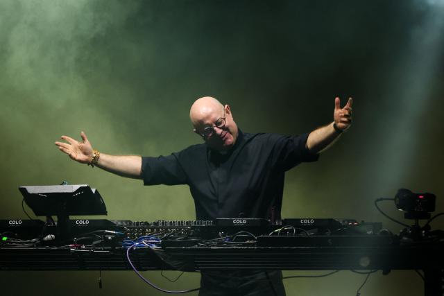 Portuguese priest and DJ Padre Guilherme performs during a free electronic music event in Plaza de Mayo, Buenos Aires on April 18, 2026, held in tribute to Pope Francis on the first anniversary of his death. (Photo by Tomas CUESTA / AFP)