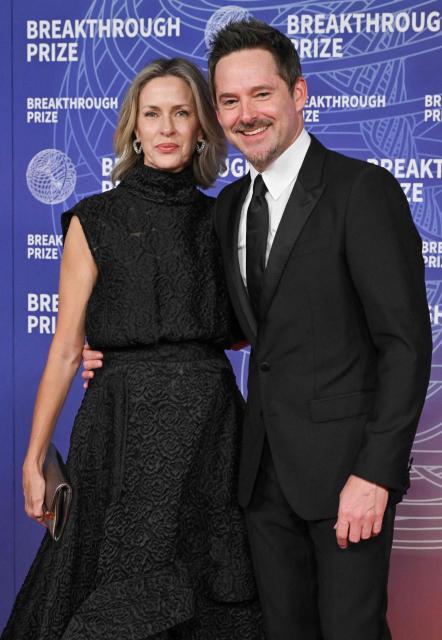 US filmmaker Scott Cooper and his wife Jocelyne Cooper attend the 12th Breakthrough Prize Ceremony at Barker Hangar in Santa Monica, California on April 18, 2026. (Photo by Lisa O'CONNOR / AFP)