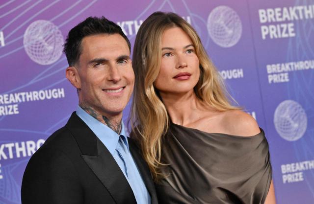 US singer Adam Levine and his wife Namibian model Behati Prinsloo attend the 12th Breakthrough Prize Ceremony at Barker Hangar in Santa Monica, California on April 18, 2026. (Photo by Lisa O'CONNOR / AFP)