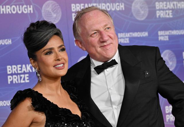 US-Mexican actress Salma Hayek Pinault and French businessman Francois-Henri Pinault attend the 12th Breakthrough Prize Ceremony at Barker Hangar in Santa Monica, California on April 18, 2026. (Photo by Lisa O'CONNOR / AFP)