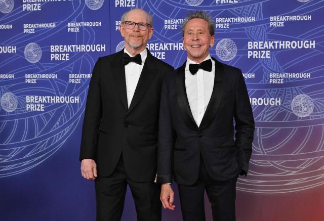 US director Ron Howard (L) and US film producer Brian Grazer attend the 12th Breakthrough Prize Ceremony at Barker Hangar in Santa Monica, California on April 18, 2026. (Photo by Lisa O'CONNOR / AFP)