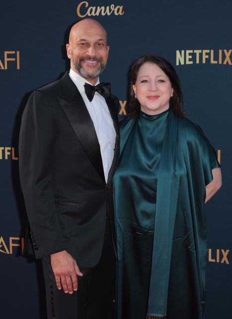 US actor Keegan-Michael Key and US producer Elisa Pugliese attend the 2026 AFI Life Achievement Award at the Dolby Theatre in Hollywood, California on April 18, 2026. US actor Eddie Murphy is the recipient of the 2026 AFI Life Achievement Award. (Photo by Etienne LAURENT / AFP)