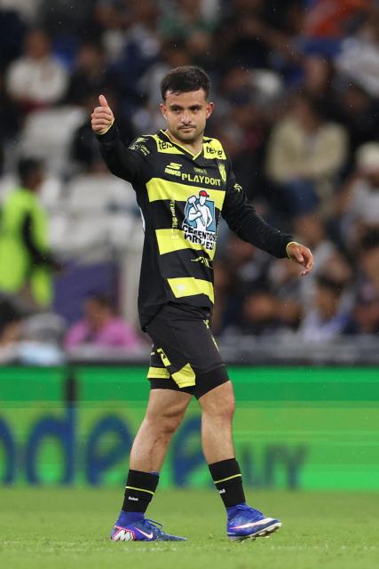 Pachuca's midfielder #26 Alan Bautista celebrates scoring his team's second goal during the Liga MX Clausura football match between Monterrey and Pachuca at BBVA stadium in Guadalupe, Nuevo Leon state, Mexico on April 18, 2026. (Photo by Julio Cesar AGUILAR / AFP)