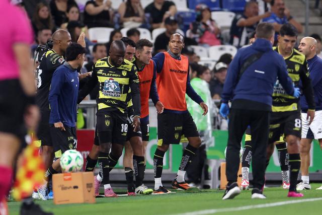 Pachuca's Ecuadorian forward #10 Enner Valencia (2nd-L) celebrates with teammates after scoring his team's third goal during the Liga MX Clausura football match between Monterrey and Pachuca at BBVA stadium in Guadalupe, Nuevo Leon state, Mexico on April 18, 2026. (Photo by Julio Cesar AGUILAR / AFP)