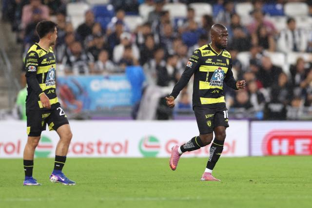 Pachuca's Ecuadorian forward #10 Enner Valencia (R) celebrates scoring his team's third goal during the Liga MX Clausura football match between Monterrey and Pachuca at BBVA stadium in Guadalupe, Nuevo Leon state, Mexico on April 18, 2026. (Photo by Julio Cesar AGUILAR / AFP)
