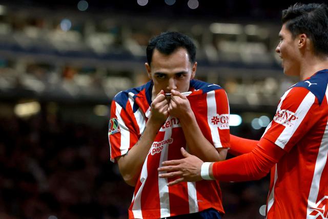 Guadalajara's forward #26 Hugo Camberos celebrates scoring his team's fifth goal during the Liga MX Clausura football match between Guadalajara and Puebla at Akron stadium in Zapopan, Jalisco state, Mexico on April 18, 2026. (Photo by ULISES RUIZ / AFP)