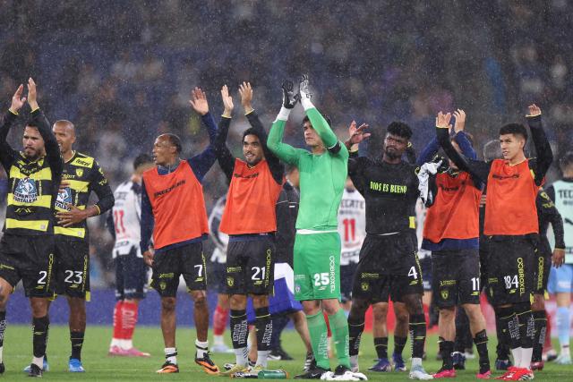 Pachuca's players greet fans after winning the Liga MX Clausura football match between Monterrey and Pachuca at BBVA stadium in Guadalupe, Nuevo Leon state, Mexico on April 18, 2026. (Photo by Julio Cesar AGUILAR / AFP)