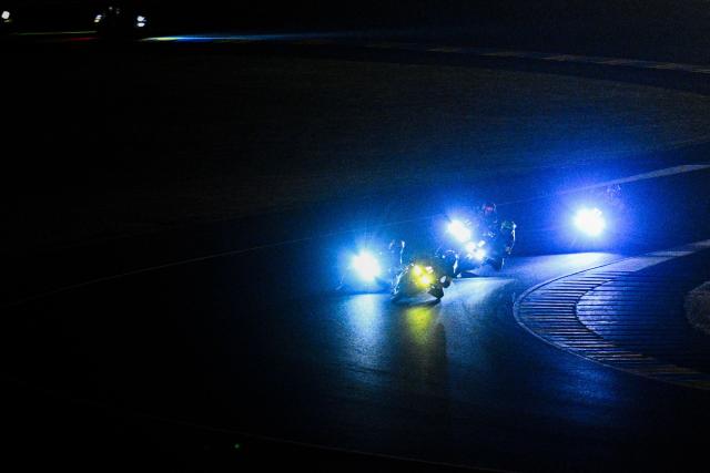 Riders compete during the 49th Le Mans 24-hours endurance moto race, in Le Mans, northwestern France on April 19, 2026. (Photo by JULIEN DE ROSA / AFP)