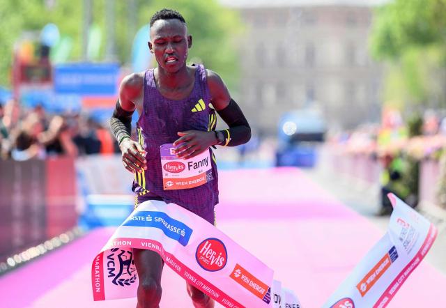 Kenya's Fanny Kiprotich crosses the finish line to win the Vienna City Marathon (VCM) in Vienna, Austria, on April 19, 2026. (Photo by MAX SLOVENCIK / APA / AFP) / Austria OUT