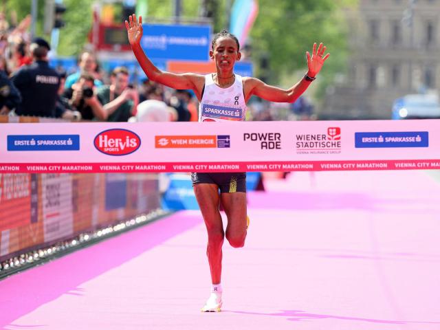 Ethiopia's Tigist Gezahagn crosses the finish line to win the women's race of the Vienna City Marathon (VCM) in Vienna, Austria, on April 19, 2026. (Photo by MAX SLOVENCIK / APA / AFP) / Austria OUT