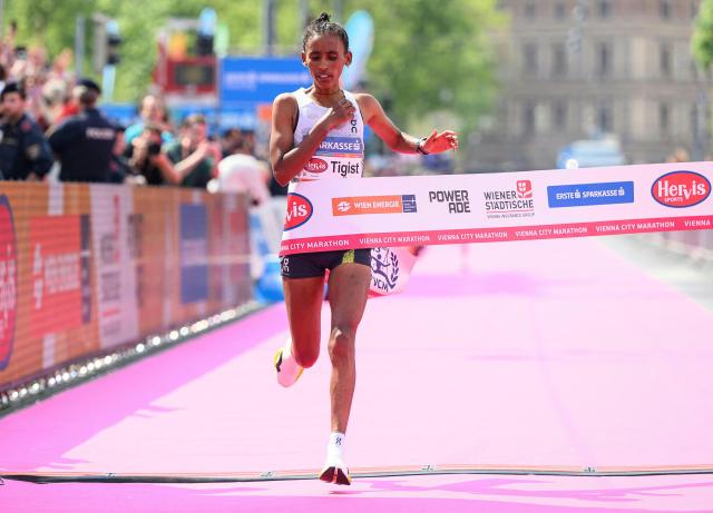 Ethiopia's Tigist Gezahagn crosses the finish line to win the women's race of the Vienna City Marathon (VCM) in Vienna, Austria, on April 19, 2026. (Photo by MAX SLOVENCIK / APA / AFP) / Austria OUT